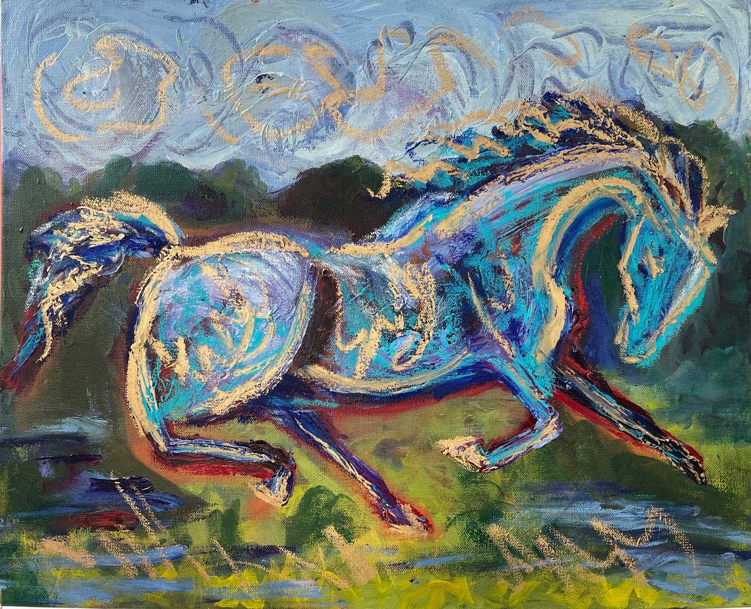 Wild Blue and Gold horse running across a wooded landscape and field.