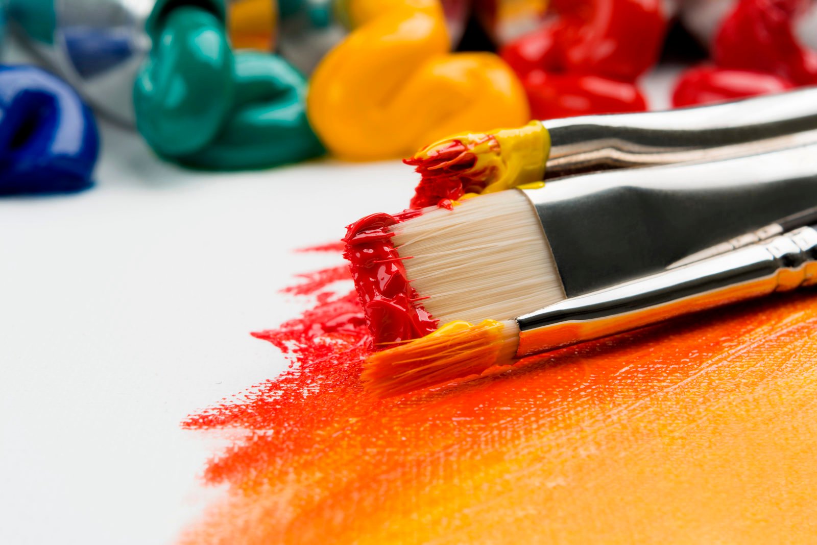 Paintbrushes with bright paint colors