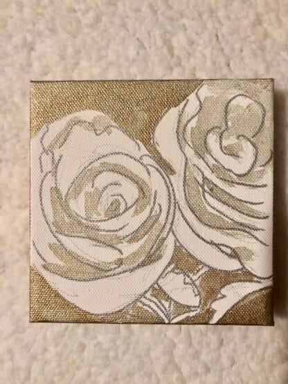 white roses on a bronze and gold background